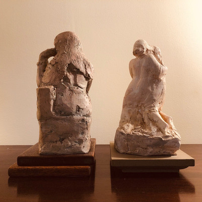 Plaster statues pair by