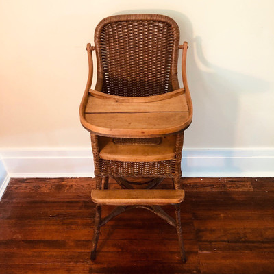 Antique caned high chair 