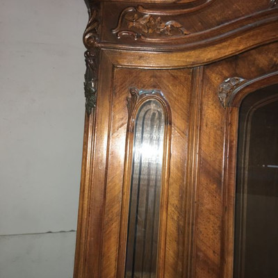 Majestous Antique Walnut Armoire With Hand Carvings and Beveled Glass