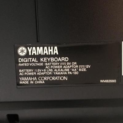 Lot 77 - Yamaha Keyboard & Stand 