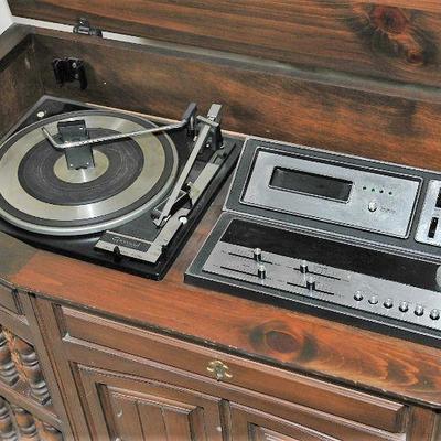 Lot 32 ~ 1950 - 1960 Sylvania record player/8-track tape/ radio console cabinet. 