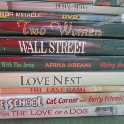 Lot 19 - Various DVD Movies - John Wayne - Shirley Temple - Frost Nixon