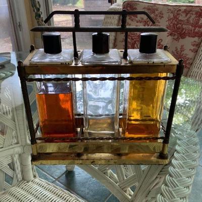 Vintage brass Liquer  3 bottle display case with lock aperatus and oriignal bottles  