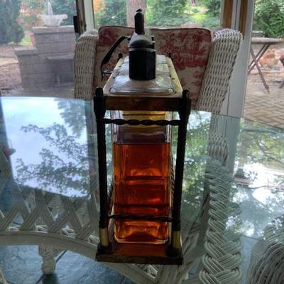 Vintage brass Liquer  3 bottle display case with lock aperatus and oriignal bottles  