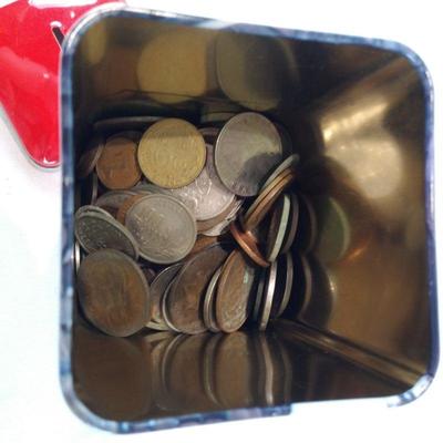 Tin Full of Foreign Coins