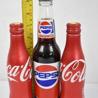 3 Bottled Sodas: 2 Coca-Cola 8.5 oz & 1 Pepsi 12 oz. Unopened