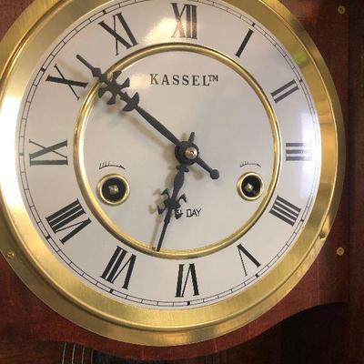 Lot #228 Kasset 31 day clock, Mahogany Cabinet - needs repair 