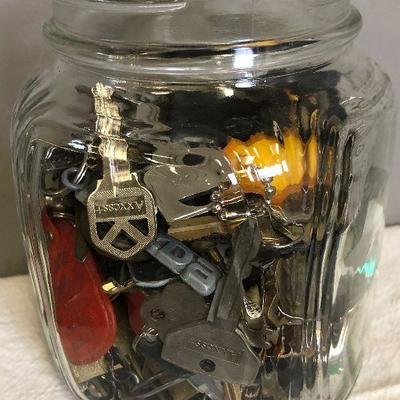 Lot #138 Jar full of keys 