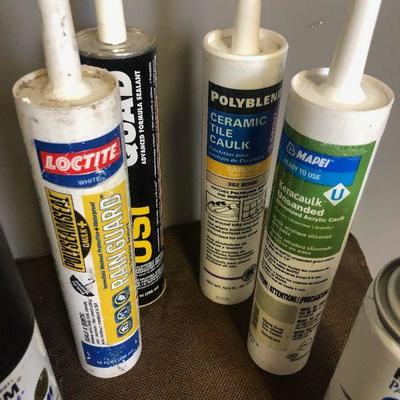 Lot #305 Large lot of Paint, calking and lubricants 