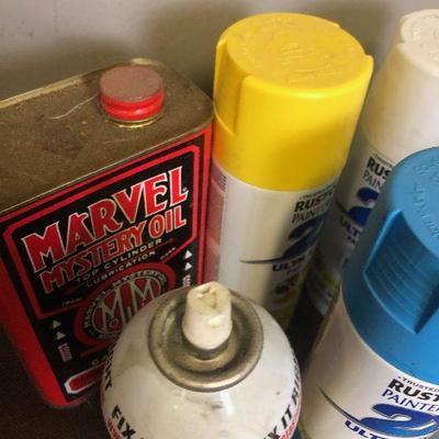 Lot #305 Large lot of Paint, calking and lubricants 