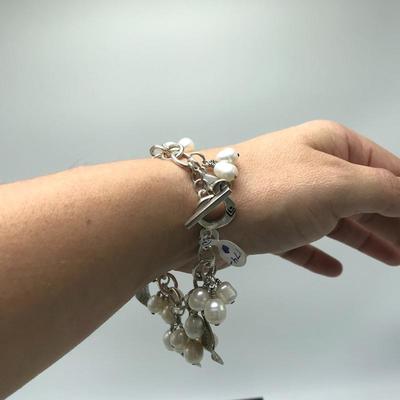 Lot 62 - Two Sterling and Pearl Bracelets 
