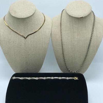Lot 81 - Two Chains and a Sparkly Bracelet Marked 925