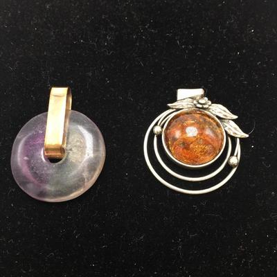 Lot 82 - Nine Pendants for Necklaces