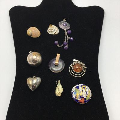 Lot 82 - Nine Pendants for Necklaces