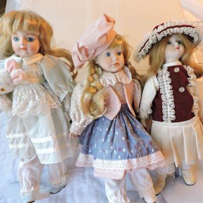 Three Vintage Porcelain Dolls