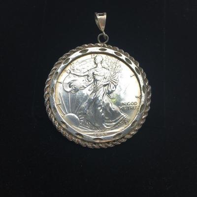 Lot 124 - Two Coin Pendants