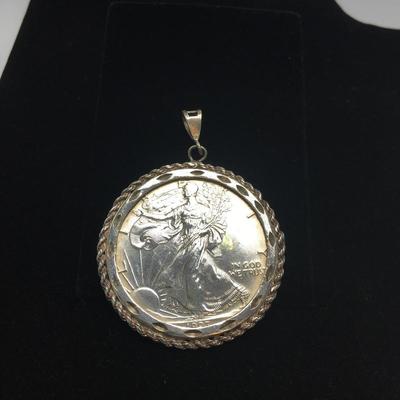 Lot 124 - Two Coin Pendants