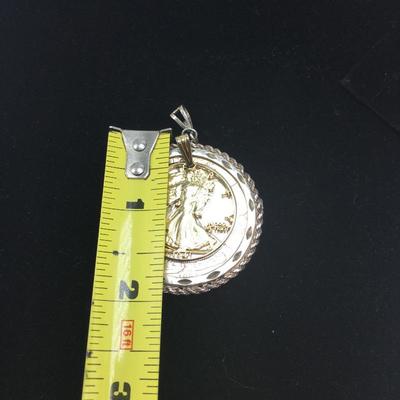 Lot 124 - Two Coin Pendants