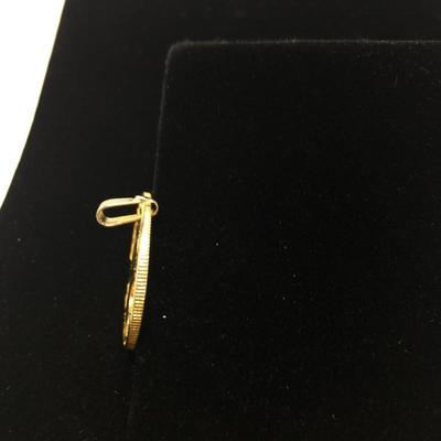 Lot 124 - Two Coin Pendants