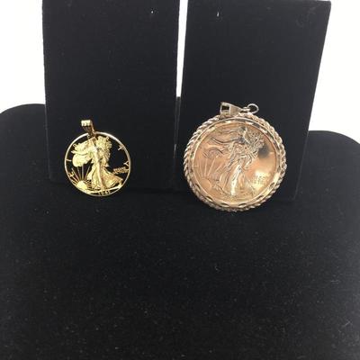Lot 124 - Two Coin Pendants