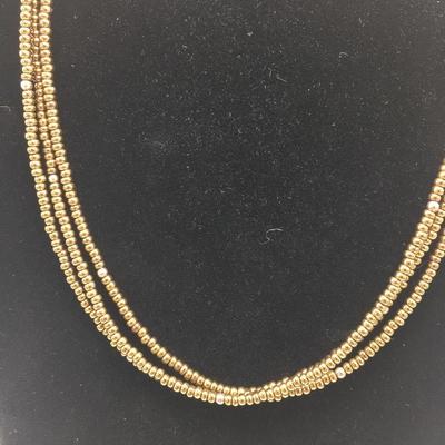 Lot 135 - Two Bronze Necklaces 