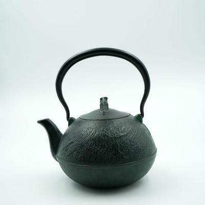 Lot 65 Cast Iron tea kettle