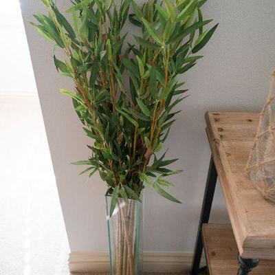 Lot 24 Tall Bamboo plant in glass vase