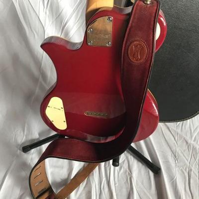 Lot #20 First Act Electric Guitar with stand and guitar case.