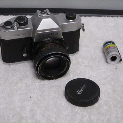 Lot 151 - Yashica TL Electro 35mm  Camera With Lenses 