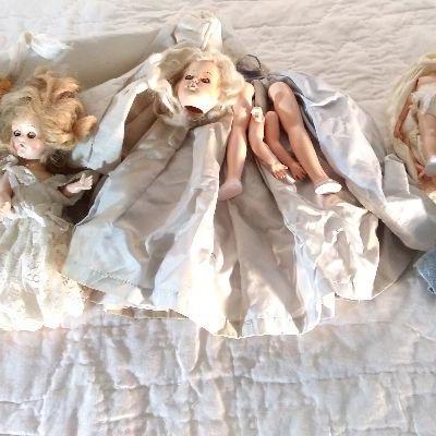 143-Sleepy eyed dolls as found