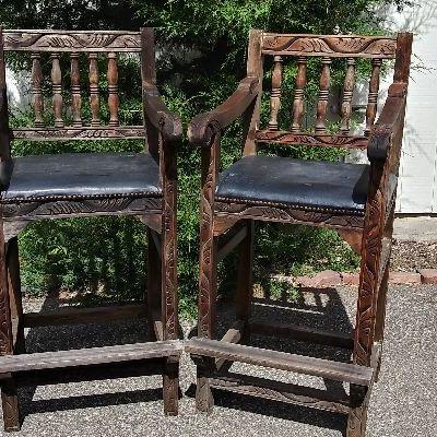 187-Hard to find hand-carved tall captain chairs