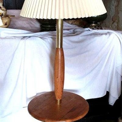 197-Two-tier wood and gold-toned floor lamp with shade works