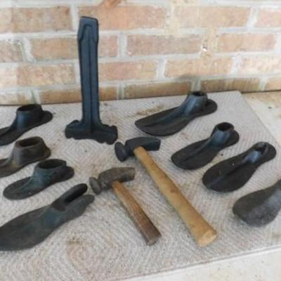 Clean Set of Cobbler's Tools Including Various Sized Lasts