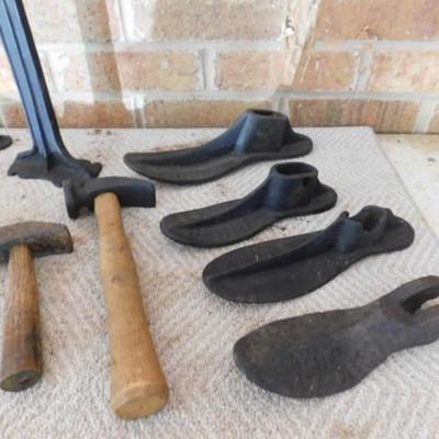 Clean Set of Cobbler's Tools Including Various Sized Lasts