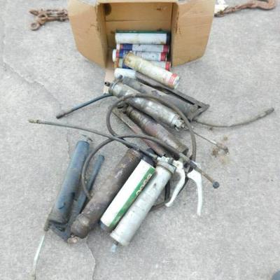 Collection of Grease Guns and Grease Refill Cannisters