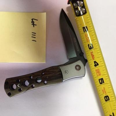 Lot 1111: Brown-tan Tac Force Folder Knife, straight blade