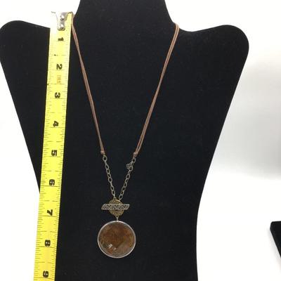 Lot 142 - Amber Waves Pendant Necklace and Bracelet