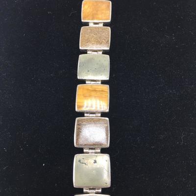 Lot 142 - Amber Waves Pendant Necklace and Bracelet