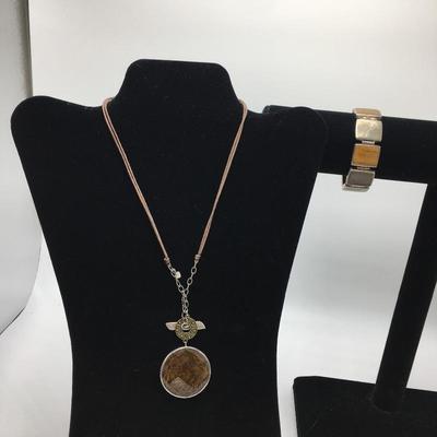 Lot 142 - Amber Waves Pendant Necklace and Bracelet