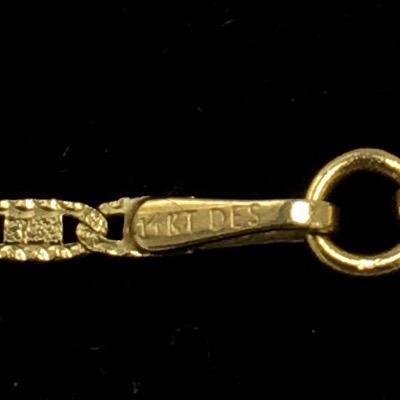 Lot 150 - 14K Gold Necklace with a  Cubic Zirconia Pendant & Earrings 