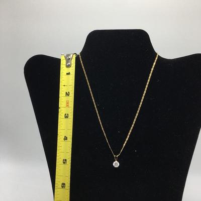 Lot 150 - 14K Gold Necklace with a  Cubic Zirconia Pendant & Earrings 