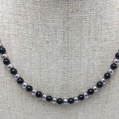 Lot 177 - Black & Silver Array