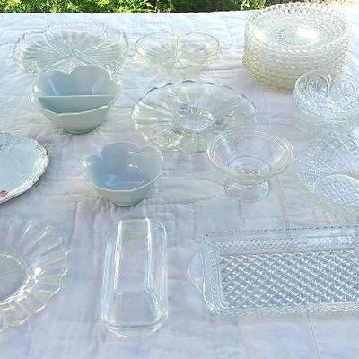 72 - Set includes a variety of glass plates dishes including small butter dish etc,