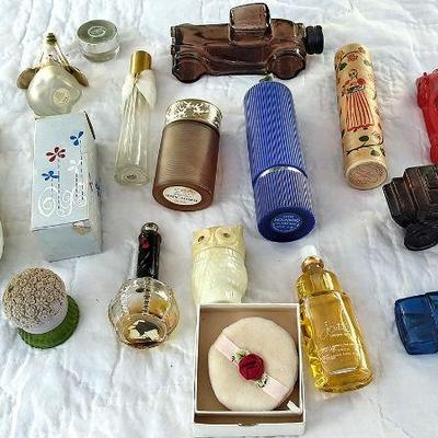 138 - Collectable Avon bottles and hat pin holder