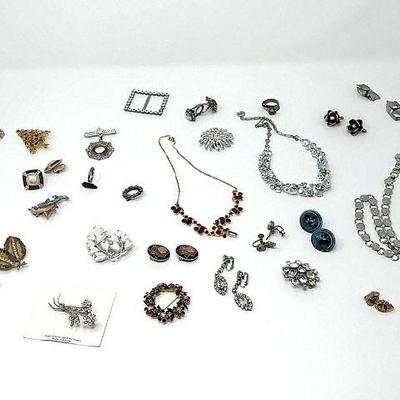 208 - Krayer, Rhinestones plus both gold and silver toned jewelry.