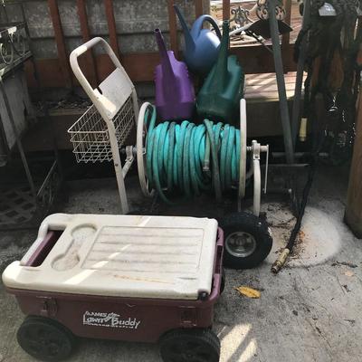 Lot 99 - Hoses, Watering Cans and More