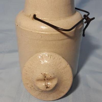 Stoneware cream colored salt jar with lid and working hasp, 7"H