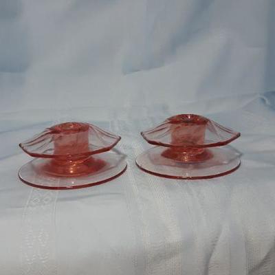 Pink spinning glass low candlesticks, 4"W x 2"H