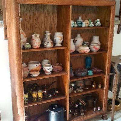 Oak display cabinet with 8 adjustable shelves, beautiful carved feet