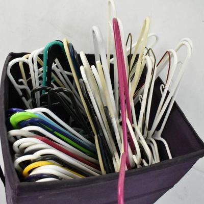 Purple Bin Filled with 50 Plastic Hangers